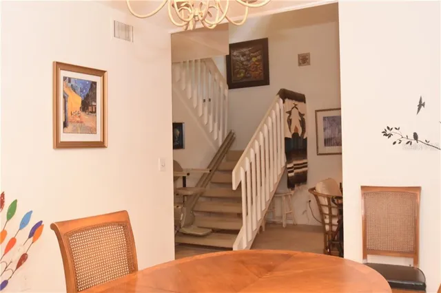 a bedroom with a bed and a view of bathroom