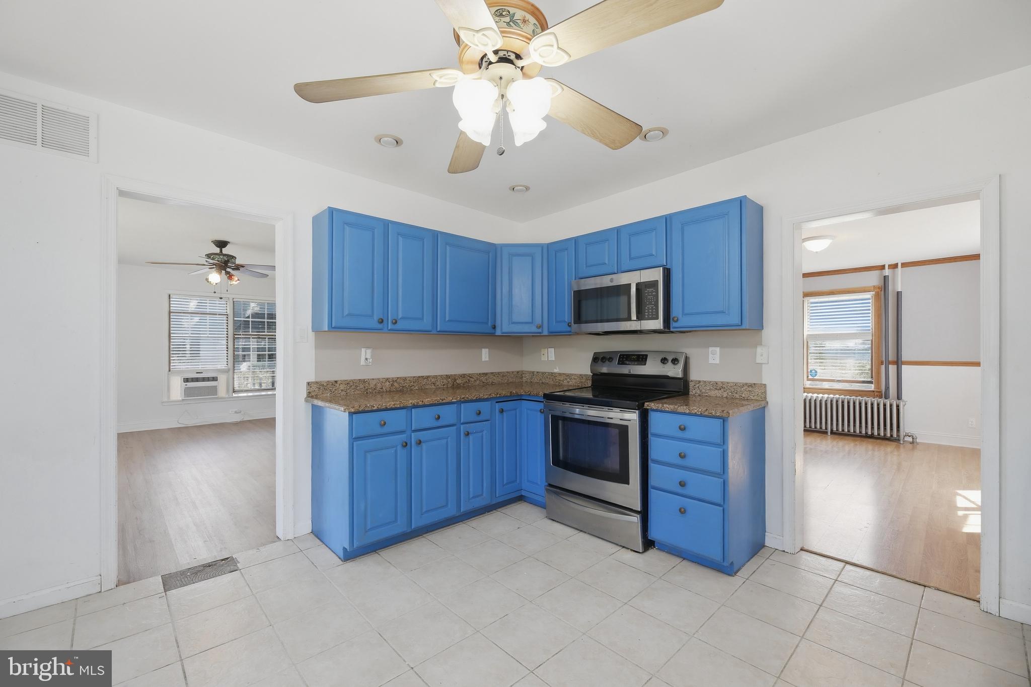 448 North Chew Road Hammonton, NJ 08037 - Photo 11 of 45 Bright blue kitchen with modern flair.