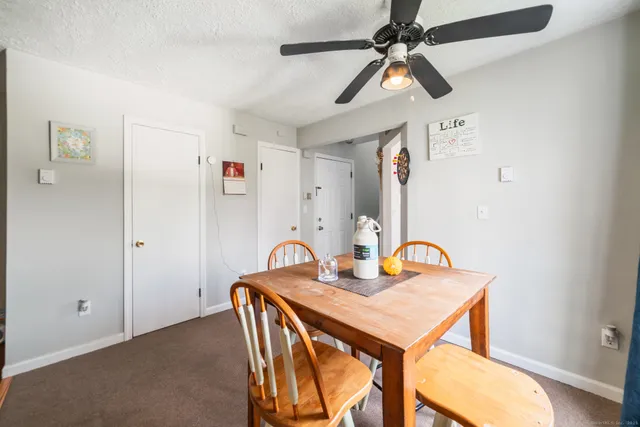 a dining room with furniture