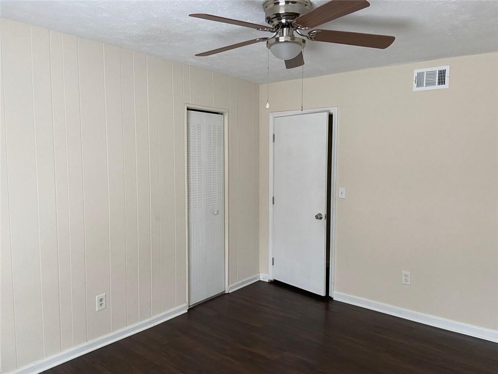 3293 Abbeywood Drive Decatur, GA 30034 - Photo 28 of 56 a view of an empty room with wooden floor