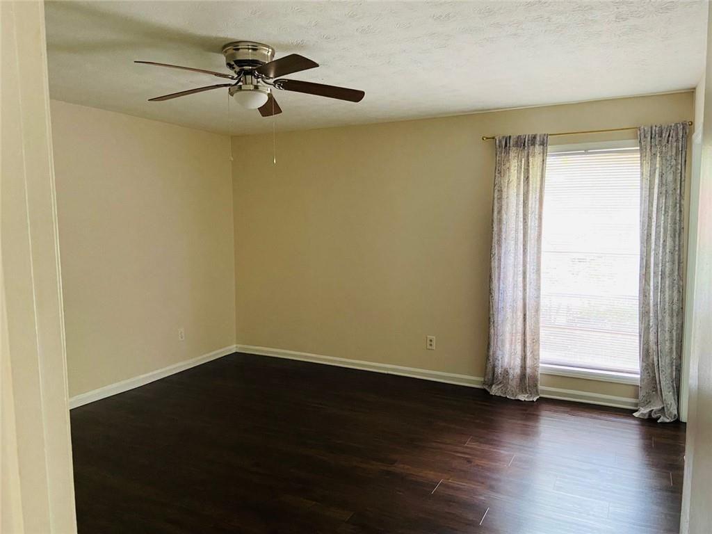 3293 Abbeywood Drive Decatur, GA 30034 - Photo 33 of 56 wooden floor in an empty room with a window