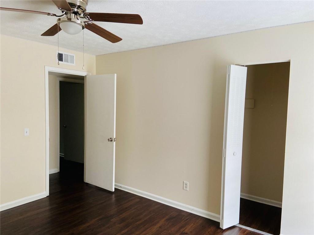 3293 Abbeywood Drive Decatur, GA 30034 - Photo 50 of 56 a view of an empty room with wooden floor