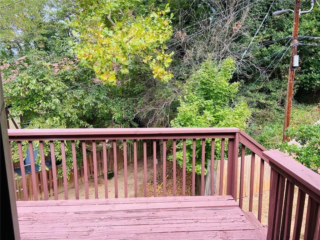 3293 Abbeywood Drive Decatur, GA 30034 - Photo 9 of 56 a view of balcony with wooden floor and fence