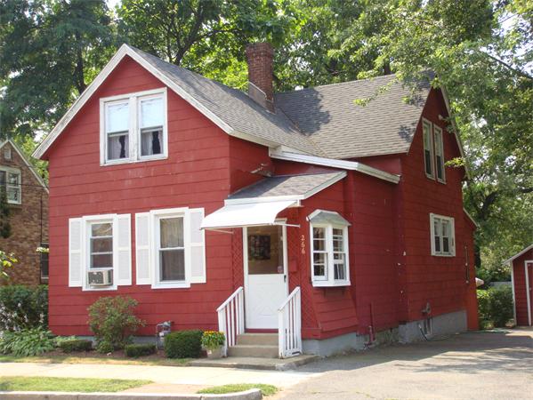 266 Nottingham Street Springfield, MA 01104 - Photo 1 of 13 a front view of a house with garden