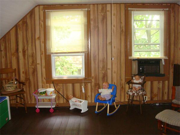 266 Nottingham Street Springfield, MA 01104 - Photo 11 of 13 a living room with furniture and a window