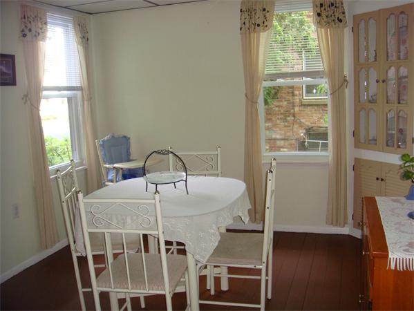 266 Nottingham Street Springfield, MA 01104 - Photo 7 of 13 a dining room with furniture and window