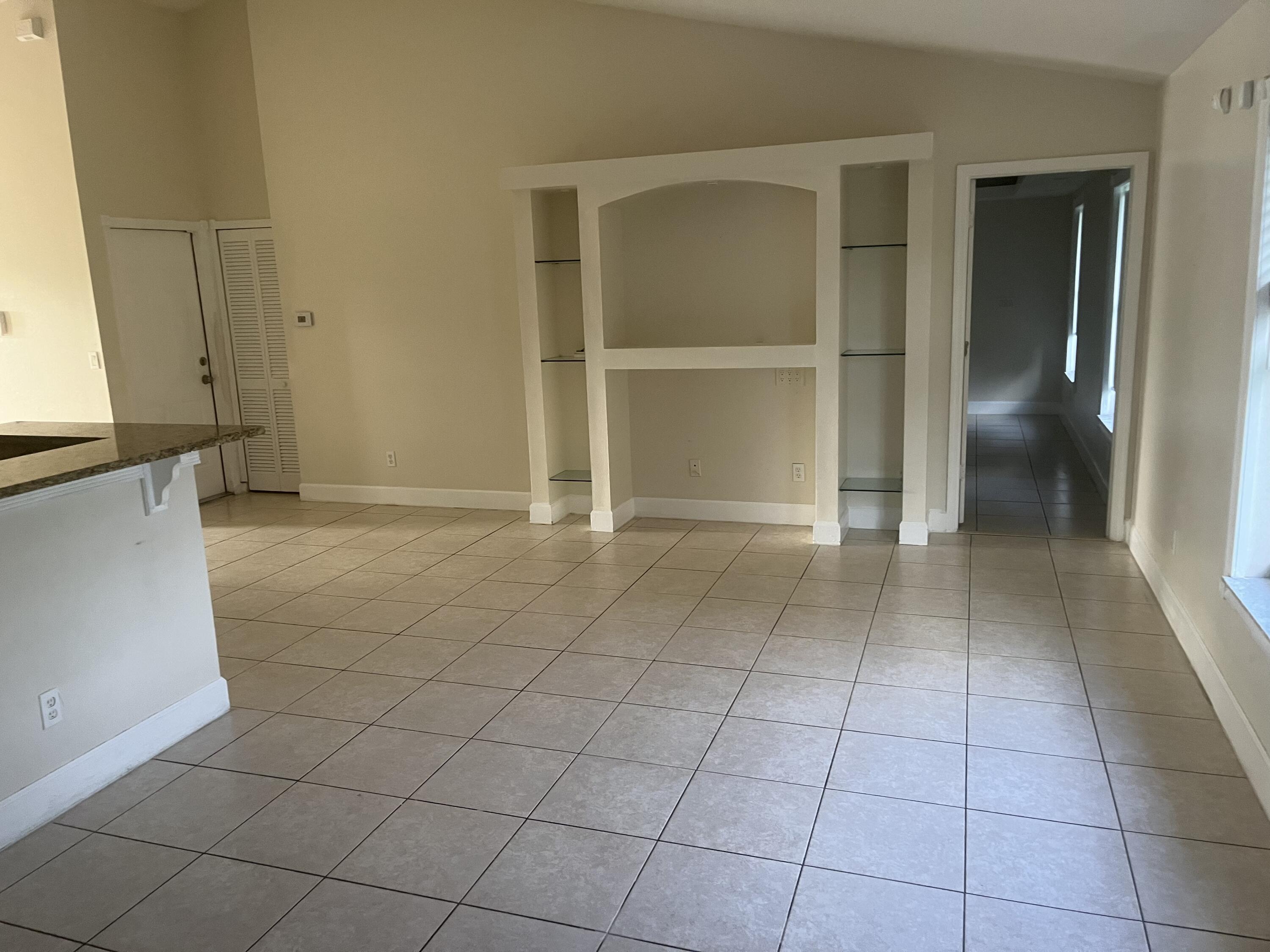 702 Southwest Amber Terrace Port St. Lucie, FL 34953 - Photo 6 of 16 an empty room with a bathroom