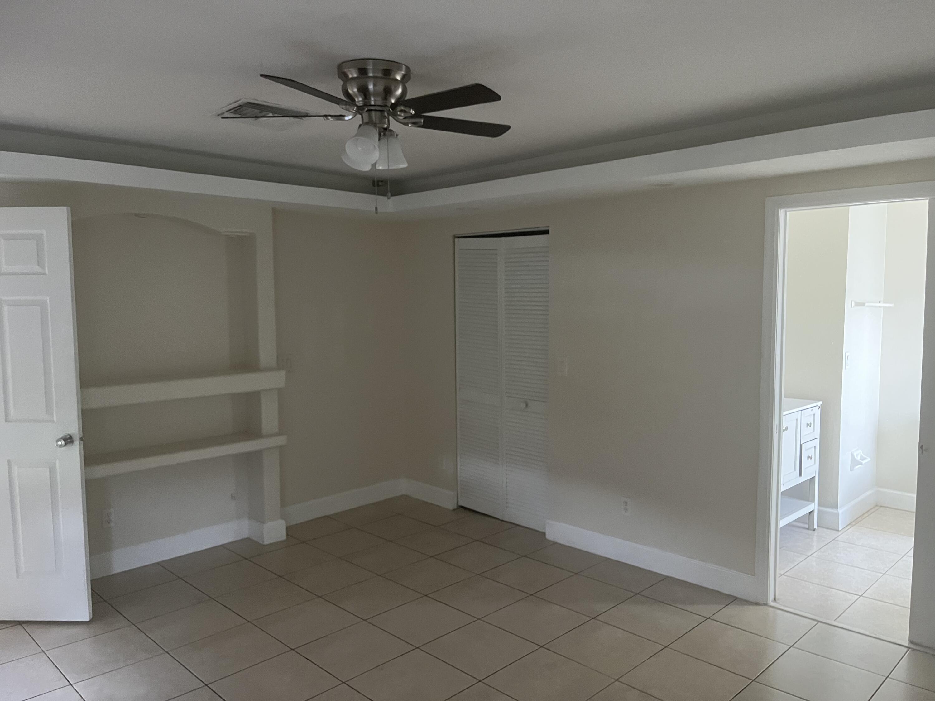 702 Southwest Amber Terrace Port St. Lucie, FL 34953 - Photo 7 of 16 a view of an empty room