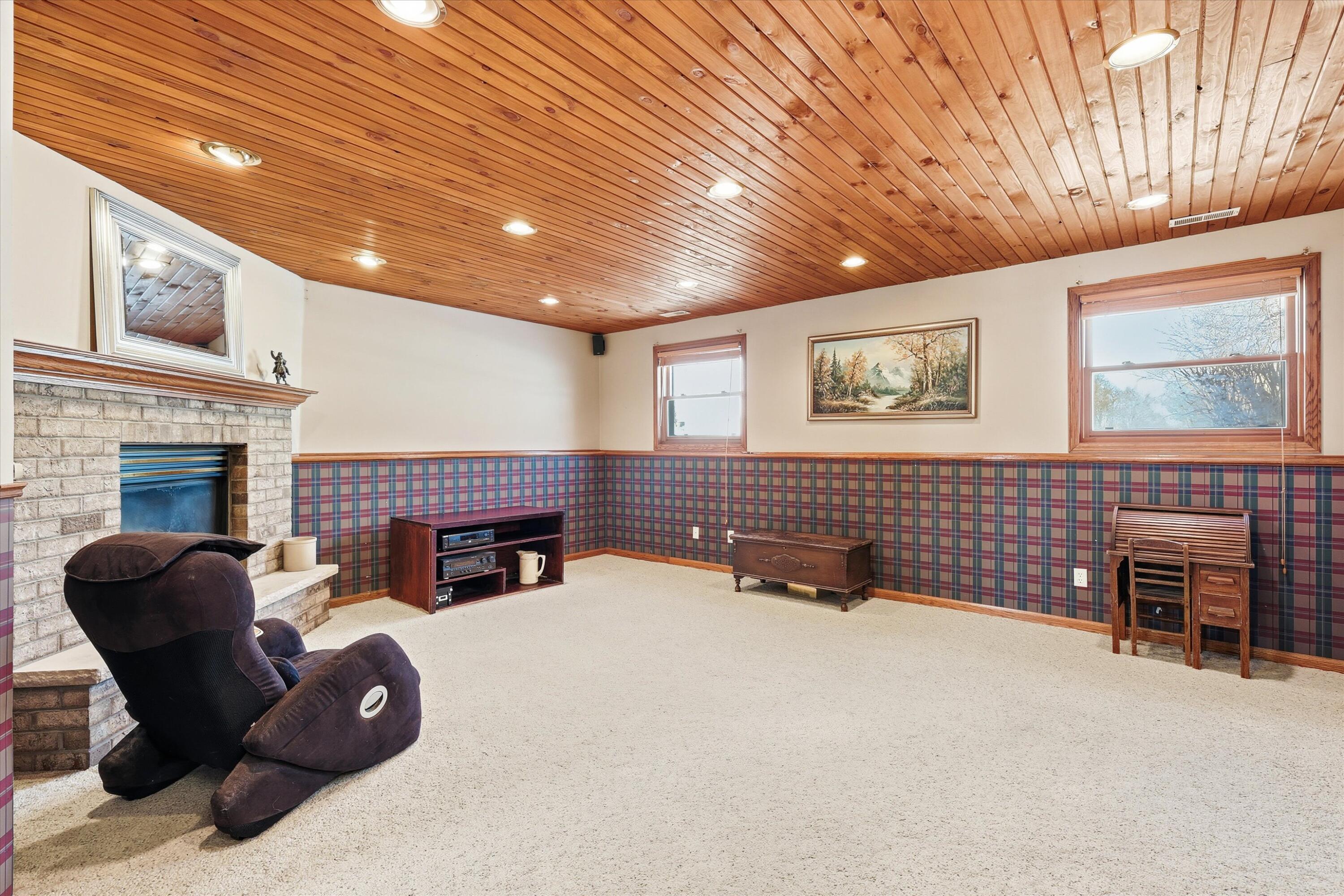 2861 Montclair Place Oshkosh, WI 54904 - Photo 24 of 27 Family room w/ fireplace