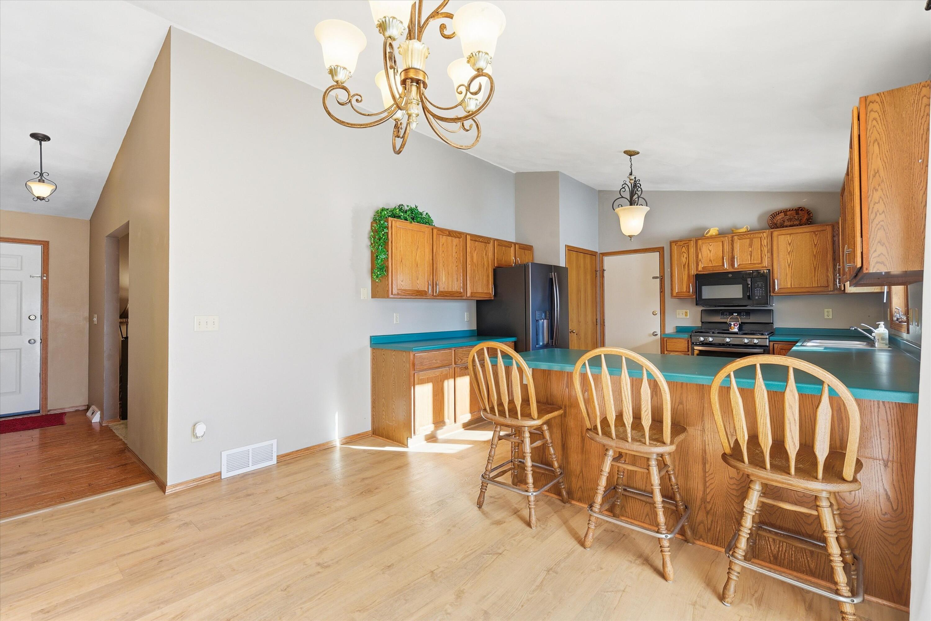 2861 Montclair Place Oshkosh, WI 54904 - Photo 9 of 27 Kitchen w/ lvp flooring