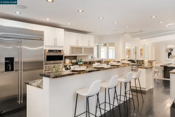 a kitchen with counter space cabinets and appliances