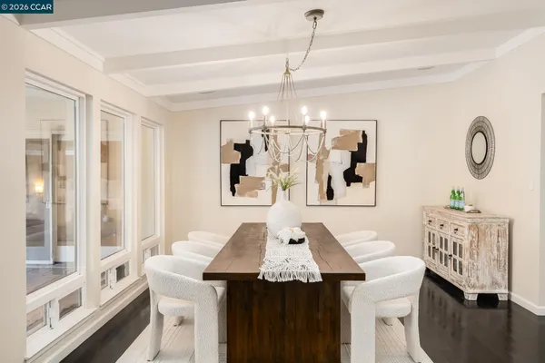 a view of a dining area with furniture window and wooden floor