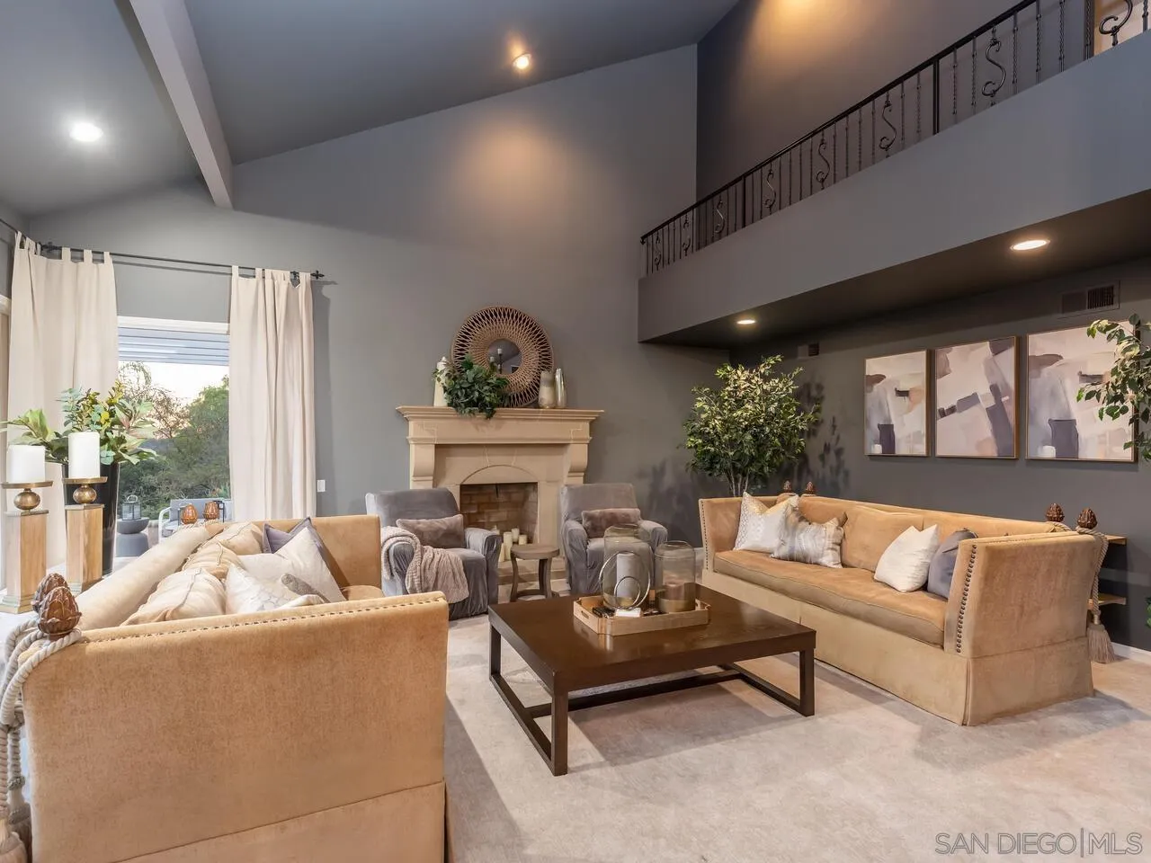 11630 Shadowglen Road El Cajon, CA 92020 - Photo 17 of 64 a living room with furniture and a fireplace