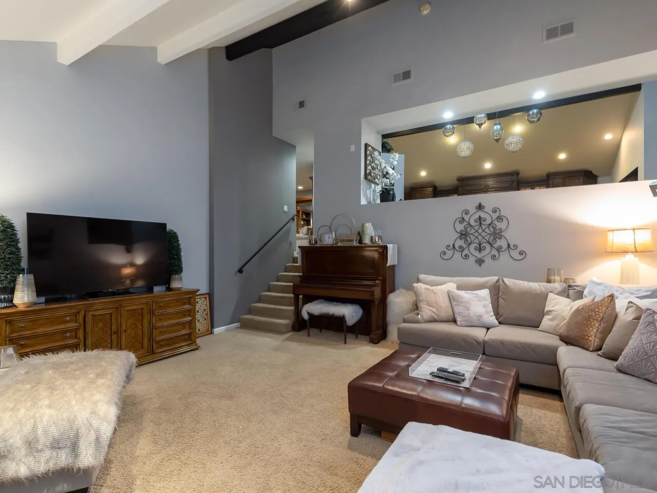 11630 Shadowglen Road El Cajon, CA 92020 - Photo 26 of 64 a living room with furniture and a flat screen tv