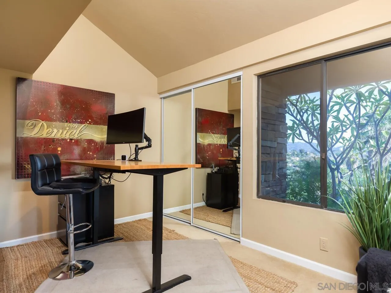 11630 Shadowglen Road El Cajon, CA 92020 - Photo 30 of 64 a view of a living room with furniture and a flat screen tv