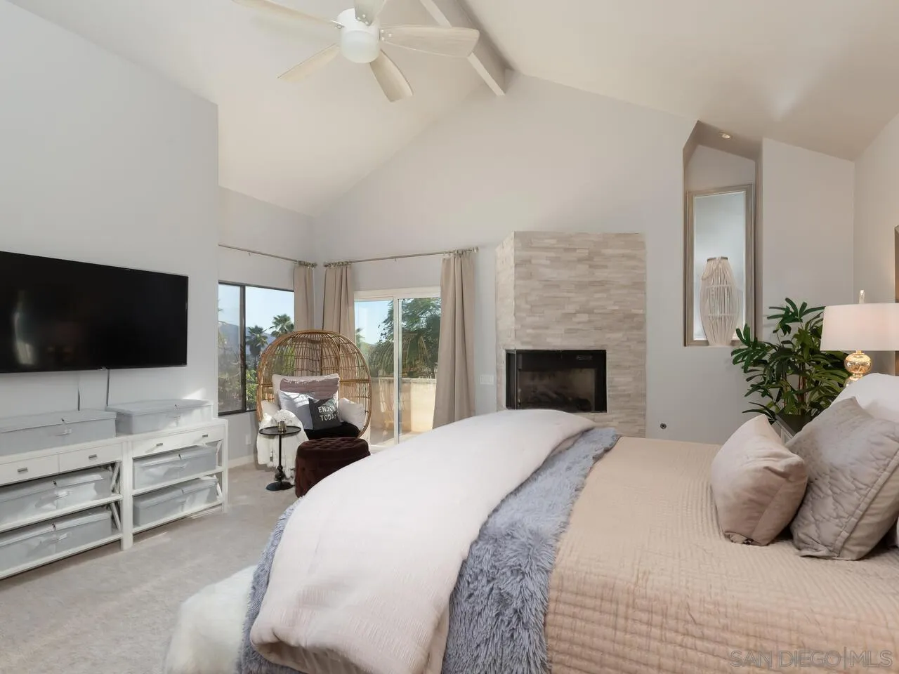 11630 Shadowglen Road El Cajon, CA 92020 - Photo 33 of 64 a bedroom with a bed and a flat screen tv