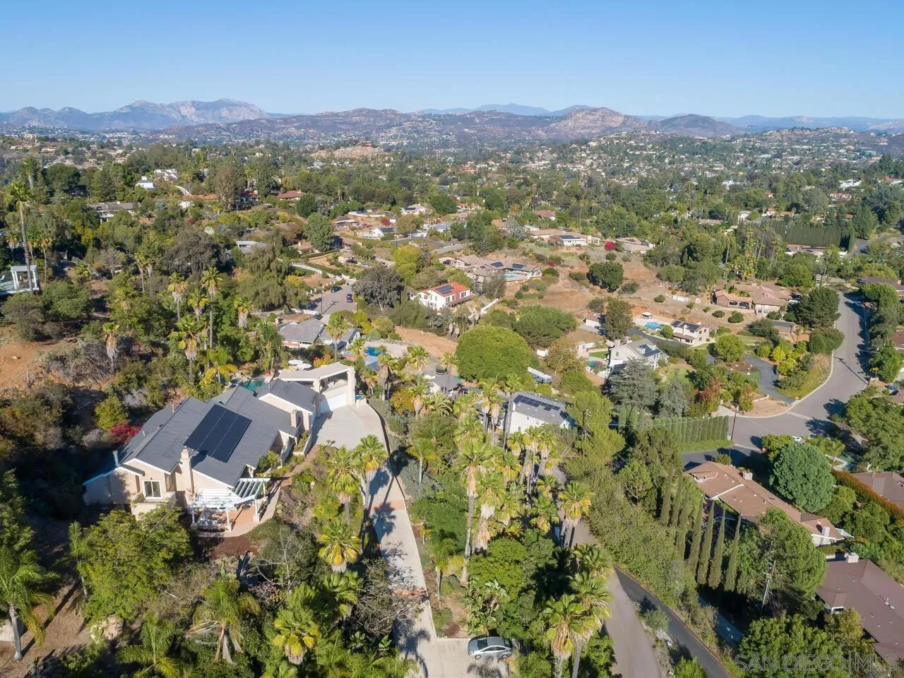 11630 Shadowglen Road El Cajon, CA 92020 - Photo 59 of 64 an aerial view of residential houses with outdoor space and trees
