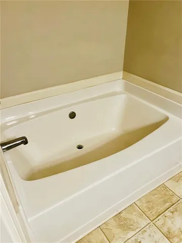a bathroom with a bathtub