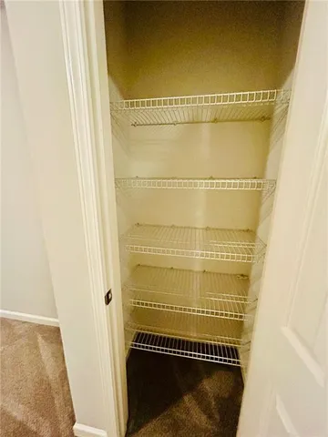 a bathroom with a glass door