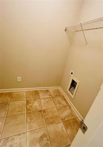 a view of a room with an empty space