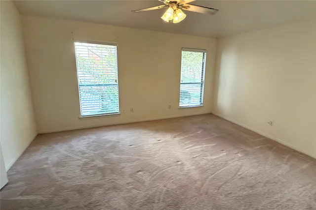 a bathroom with a double vanity sink and mirror