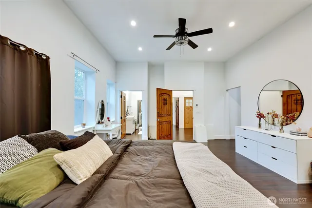 a bed room with a bed and a dresser