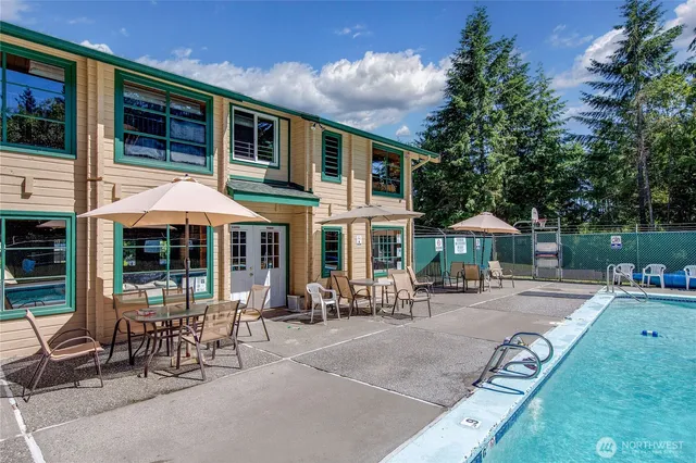 a view of a pathway with a tree
