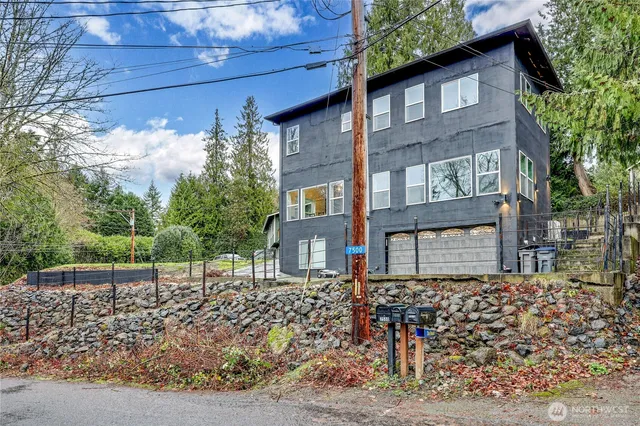 a view of swimming pool with a lounge chairs
