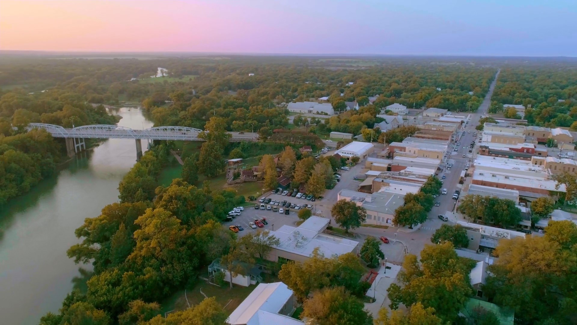 306 Constanza Trail Bastrop, TX 78602 - Photo 4 of 6 an aerial view of residential houses with outdoor space and river view