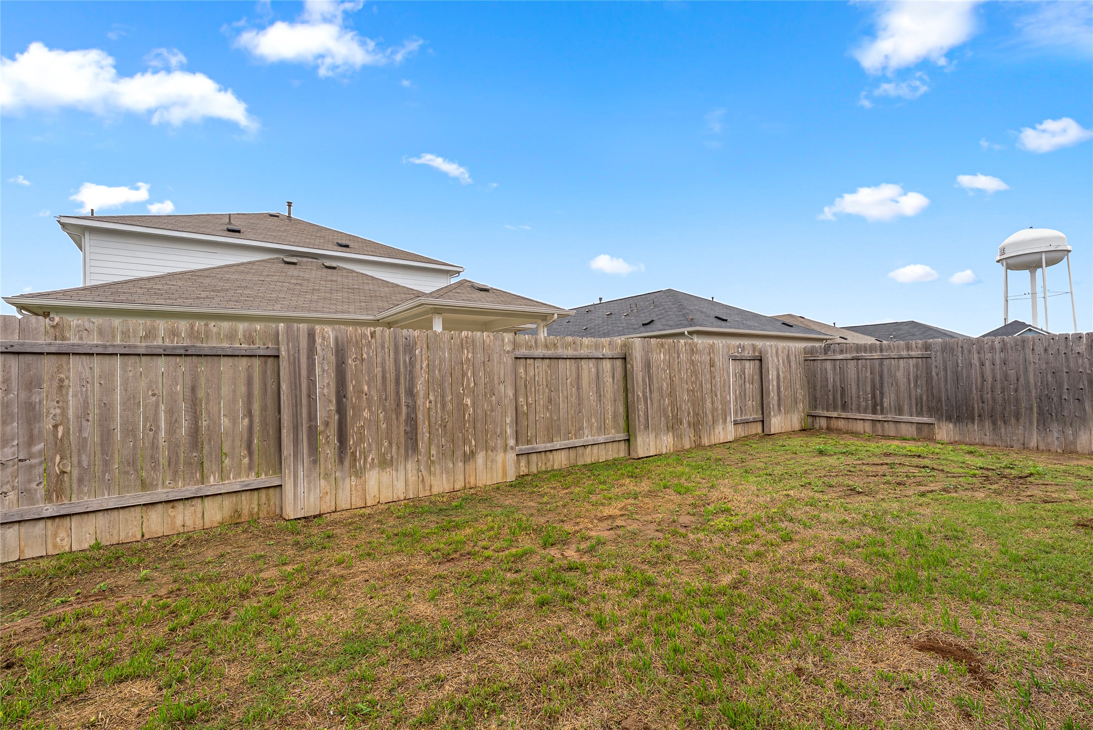 149 Biscayne Drive Kyle, TX 78640 - Photo 19 of 20 a view of a backyard