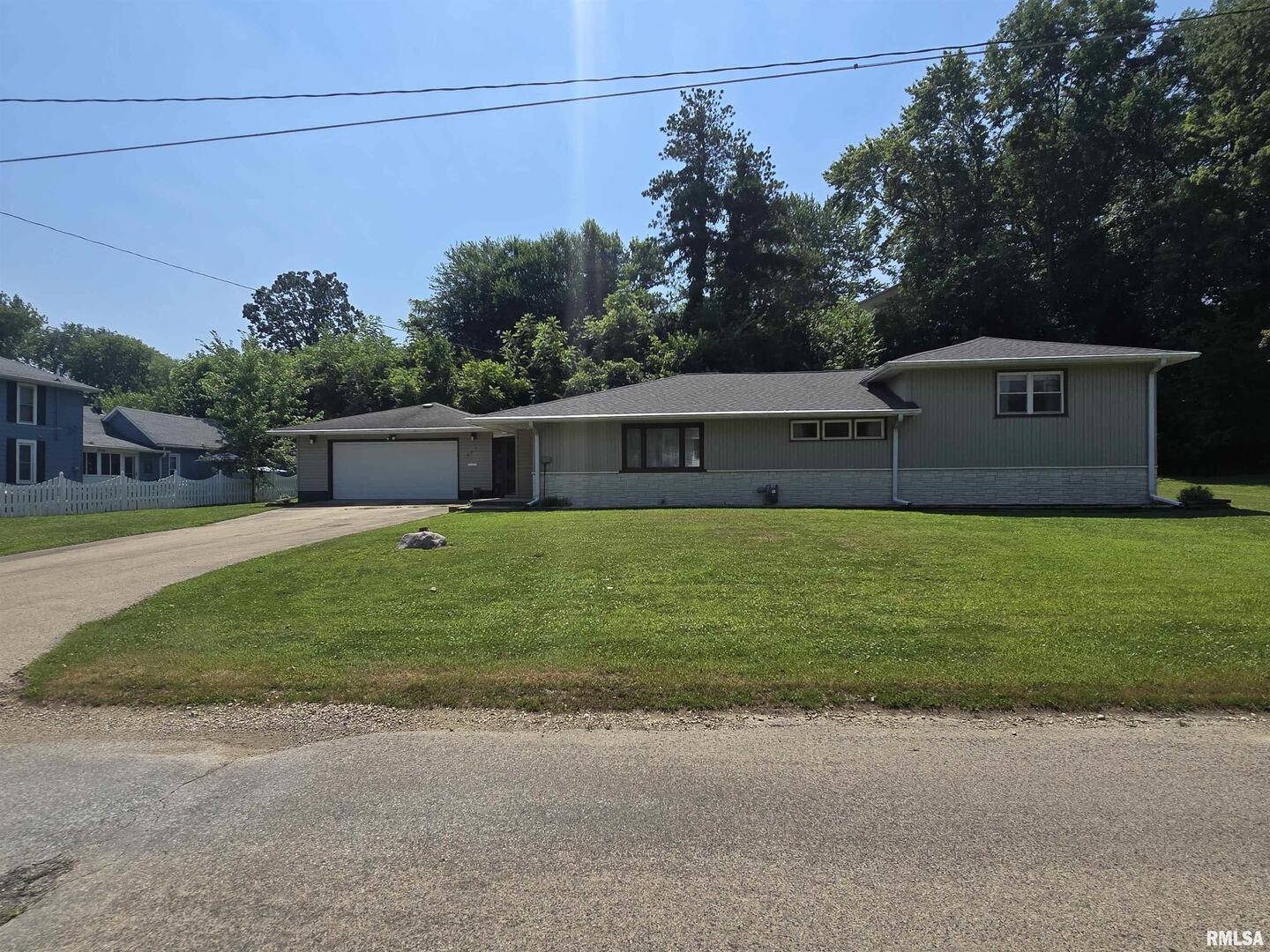 507 South Church Street Albany, IL 61230 - Photo 15 of 15 a front view of house with yard and green space