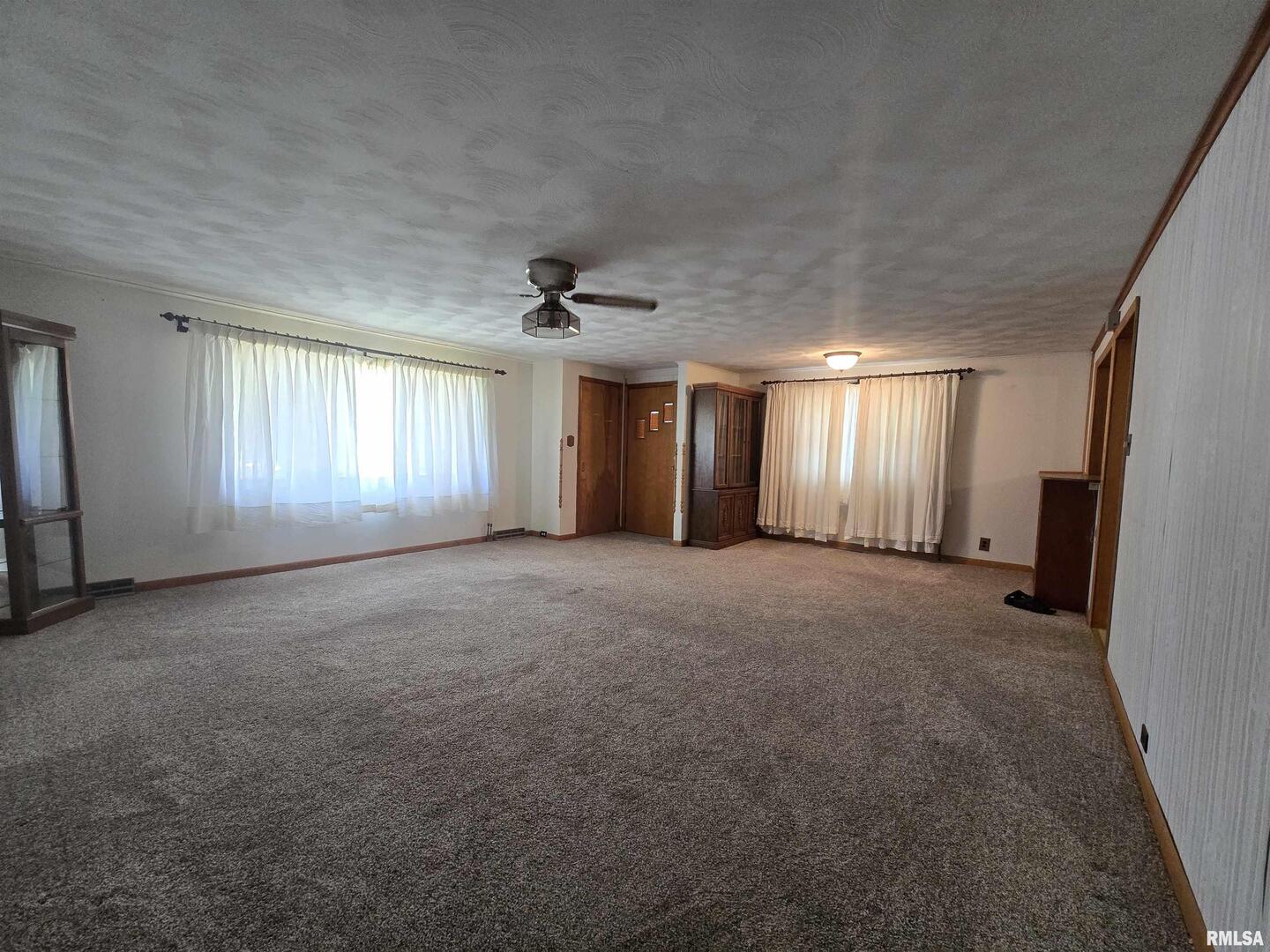 507 South Church Street Albany, IL 61230 - Photo 5 of 15 a view of a livingroom with a fireplace