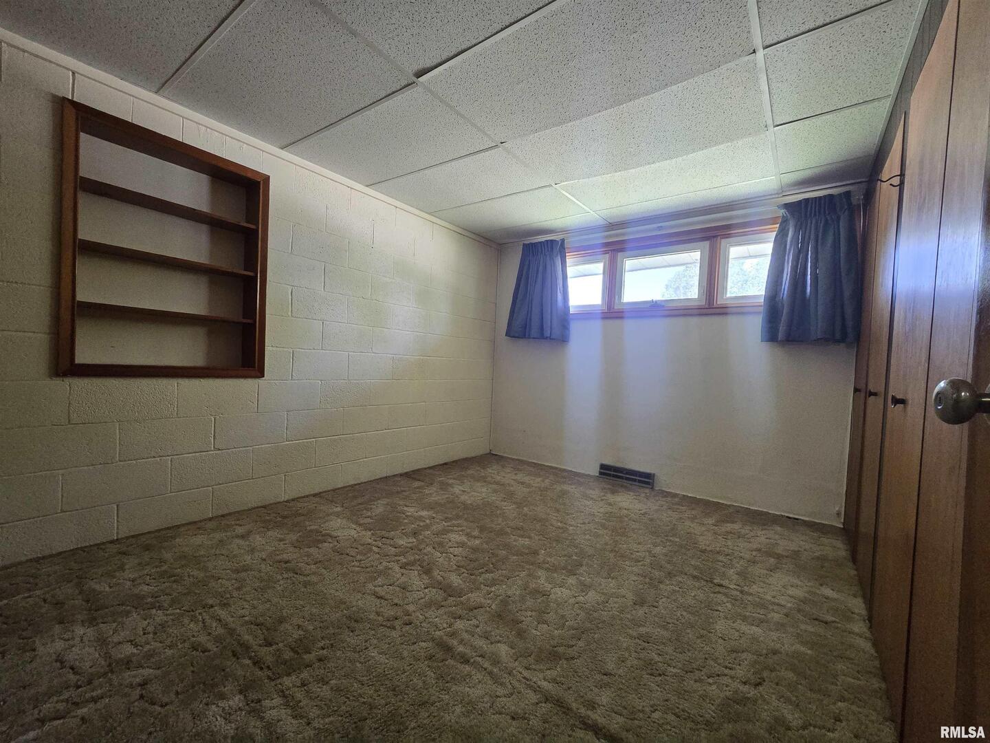 507 South Church Street Albany, IL 61230 - Photo 6 of 15 a view of an empty room with a window