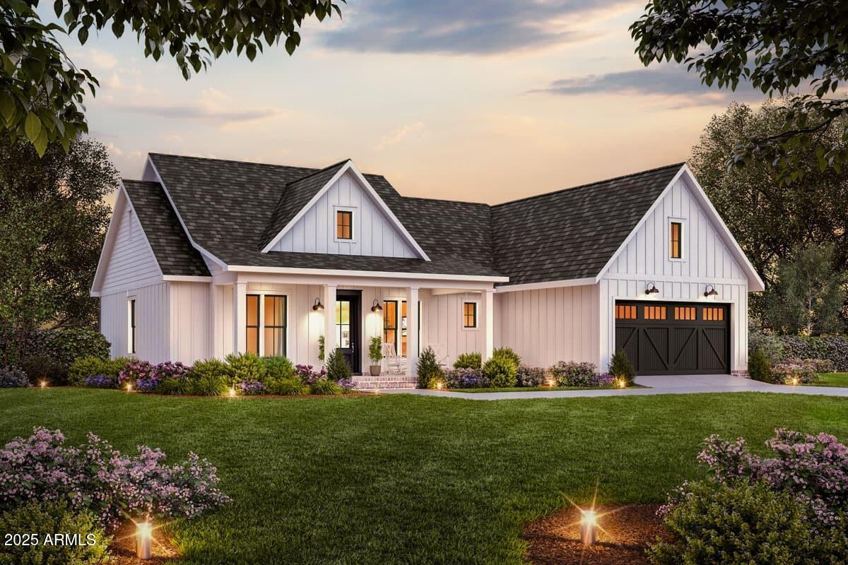 6 South Ellison Road Coolidge, AZ 85128 - Photo 2 of 13 a front view of a house with a garden and plants