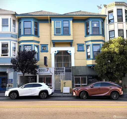 a front view of a house with parking space