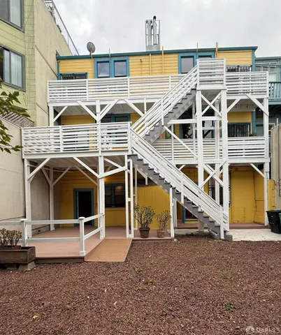 a view of a house with roof deck