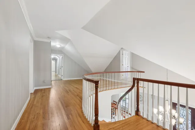 a bathroom with a toilet a sink and a mirror