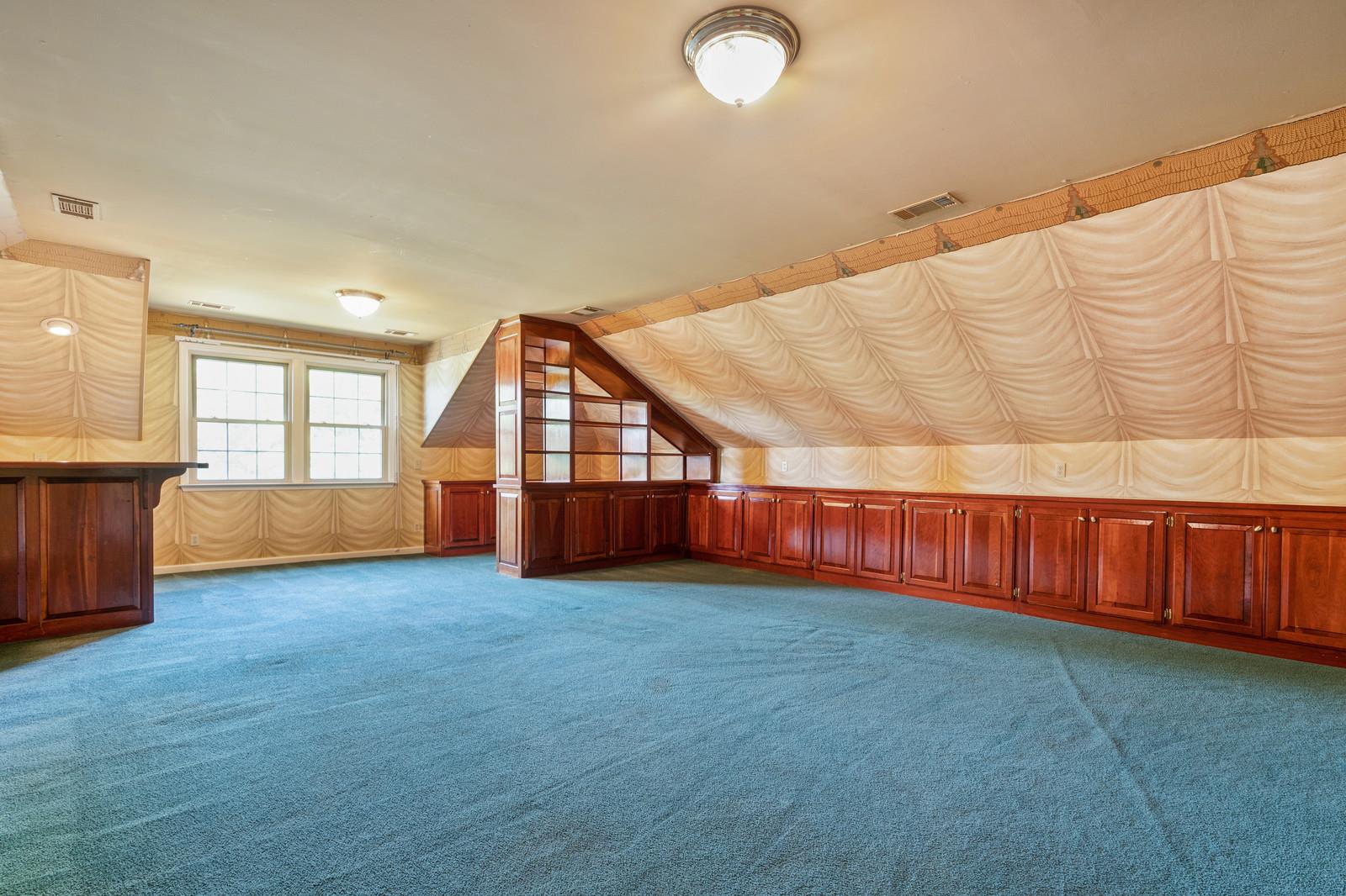 11363 Owens Chapel Road Springfield, TN 37172 - Photo 21 of 30 a view of an empty room with wooden floor and windows