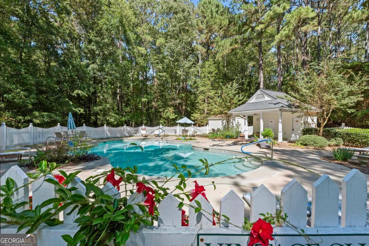 1540 Vintage Club Road Greensboro, GA 30642 - Photo 67 of 71 a front view of house with yard and trees