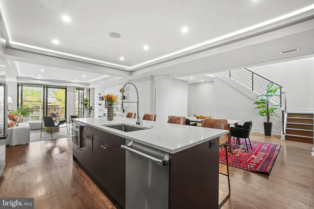 a view of a living room and dining room