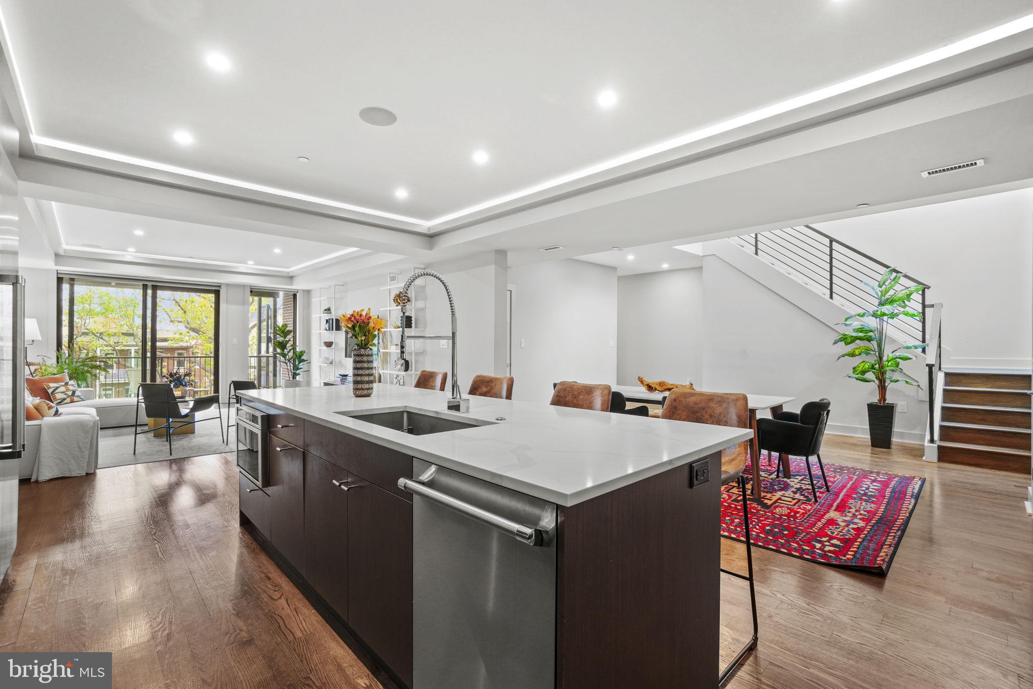 1201 Kenyon Street Northwest, Unit 5 Washington, DC 20010 - Photo 12 of 35 a view of a living room and dining room