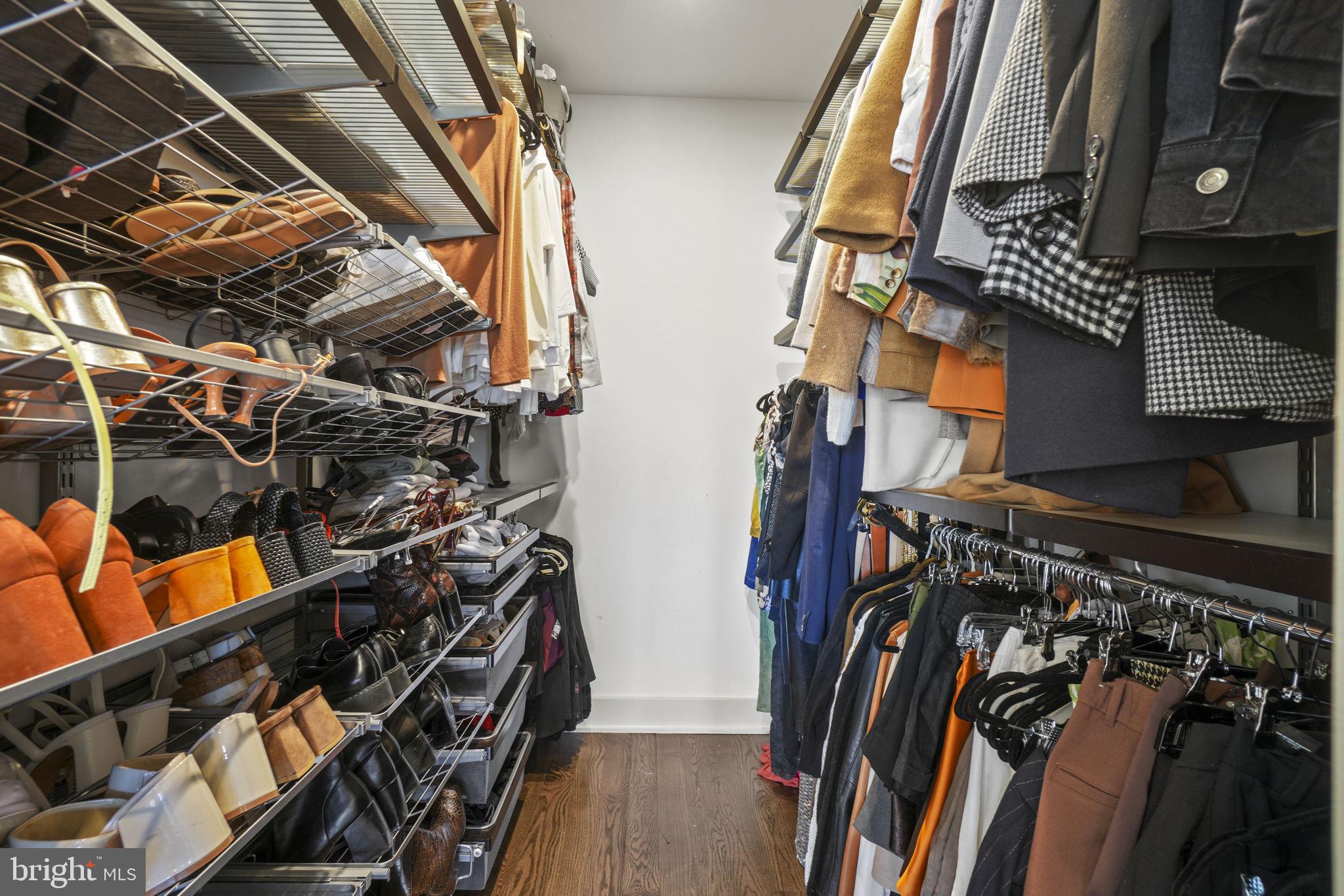 1201 Kenyon Street Northwest, Unit 5 Washington, DC 20010 - Photo 17 of 35 a view of walk in closet with clothes