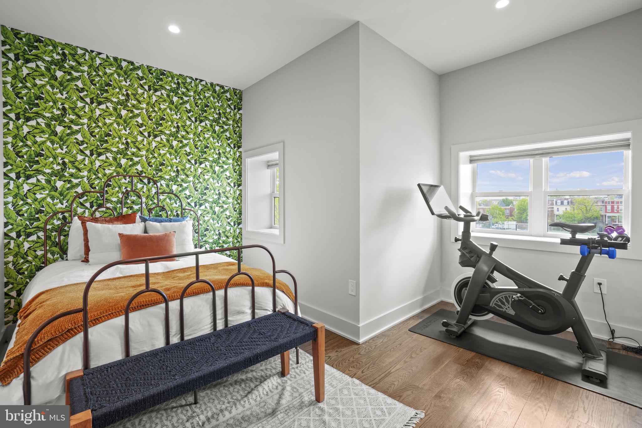 1201 Kenyon Street Northwest, Unit 5 Washington, DC 20010 - Photo 18 of 35 a bedroom with furniture and a window