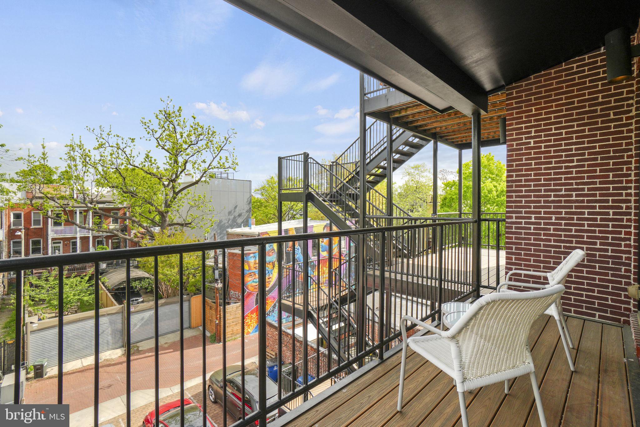 1201 Kenyon Street Northwest, Unit 5 Washington, DC 20010 - Photo 25 of 35 a view of balcony with furniture