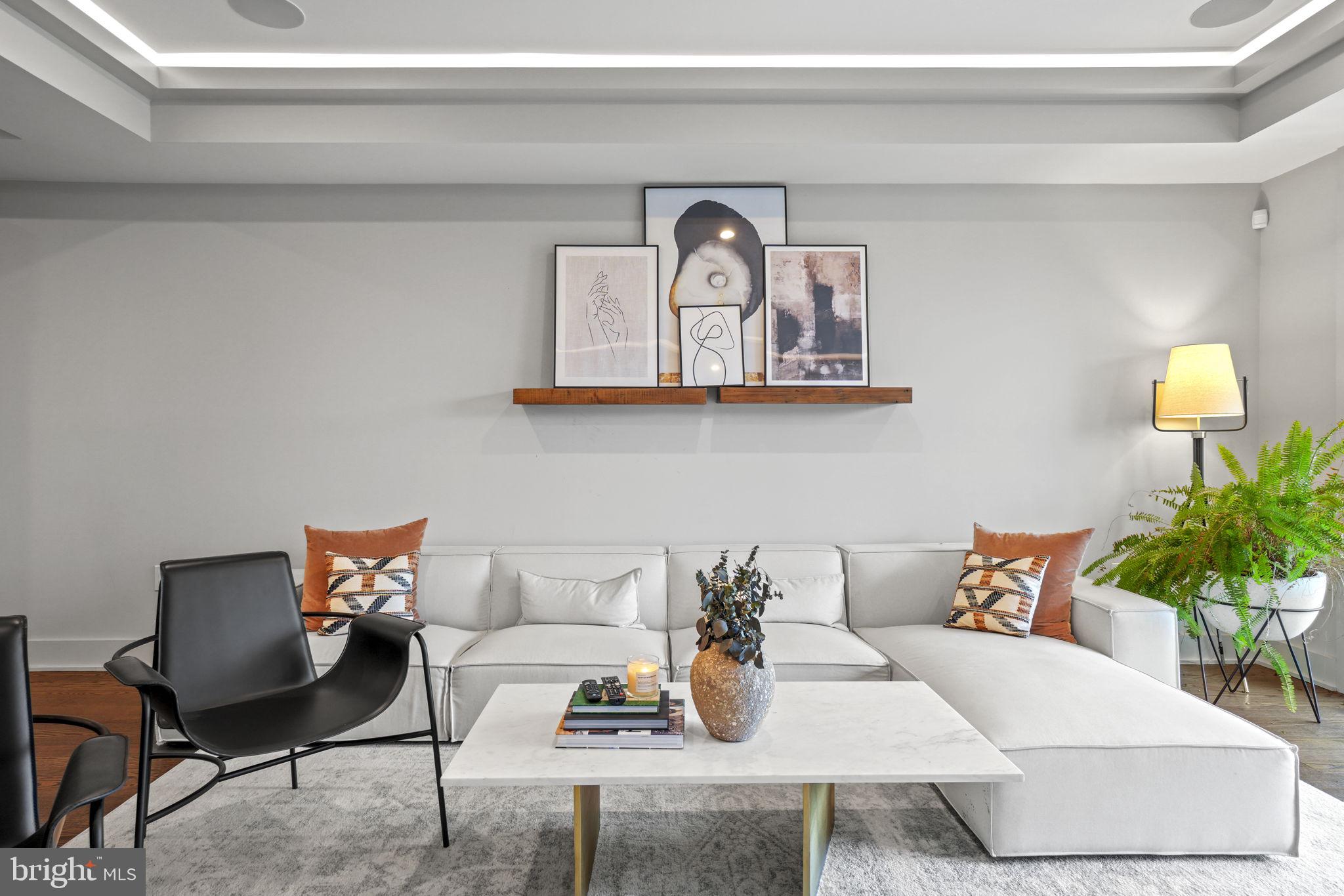 1201 Kenyon Street Northwest, Unit 5 Washington, DC 20010 - Photo 6 of 35 a living room with furniture