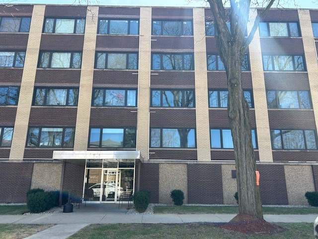 5915 West Gunnison Street, Unit 2F Chicago, IL 60630 - Photo 1 of 10 a front view of a building