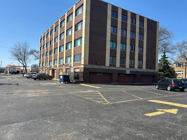 a view of tall building with a street