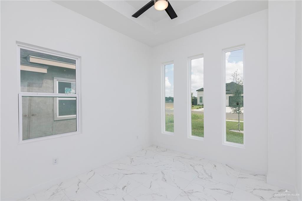 915 Pecan Street Alton, TX 78573 - Photo 13 of 22 an empty room with windows