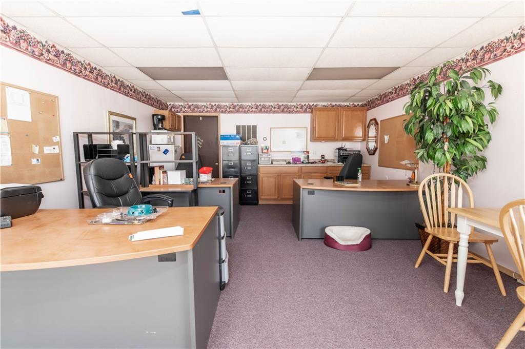 1071-1075 Philadelphia Street Indiana, PA 15701 - Photo 18 of 21 a dining room with furniture and a floor to ceiling window