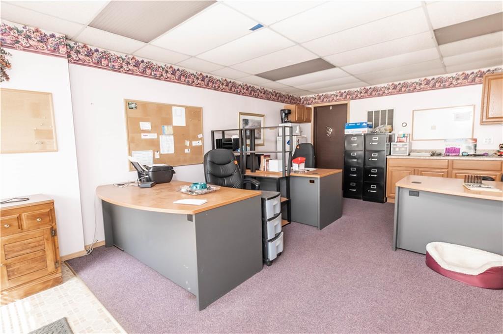 1071-1075 Philadelphia Street Indiana, PA 15701 - Photo 19 of 21 a view of a kitchen with kitchen island a counter top space a sink stainless steel appliances and cabinets